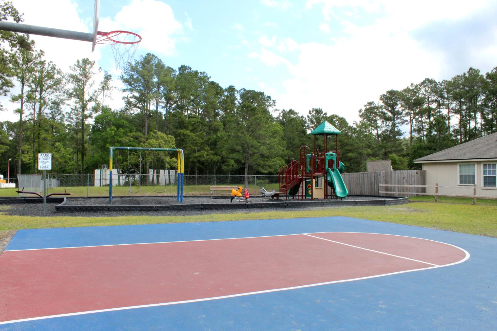 basketball court and playground at Ridaught Landing Park