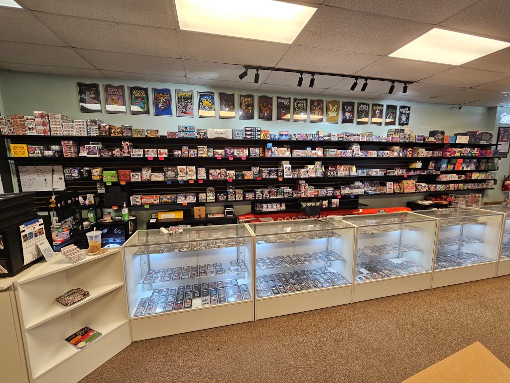 image of a retail store with glass cases holding playing cards