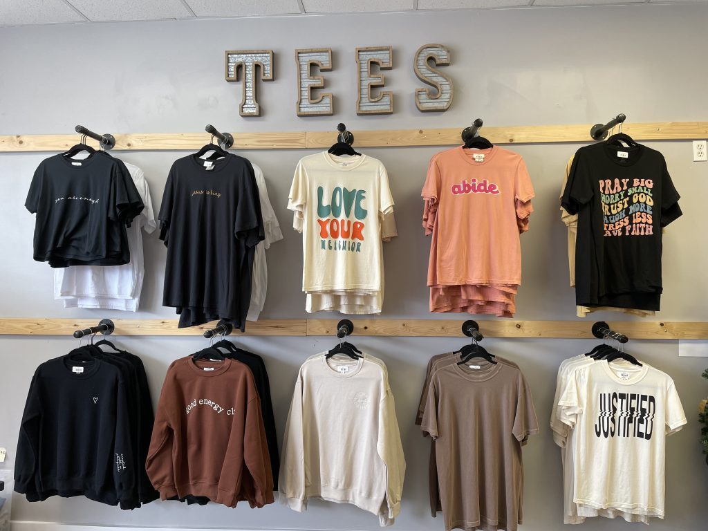 wall of tees in boutique