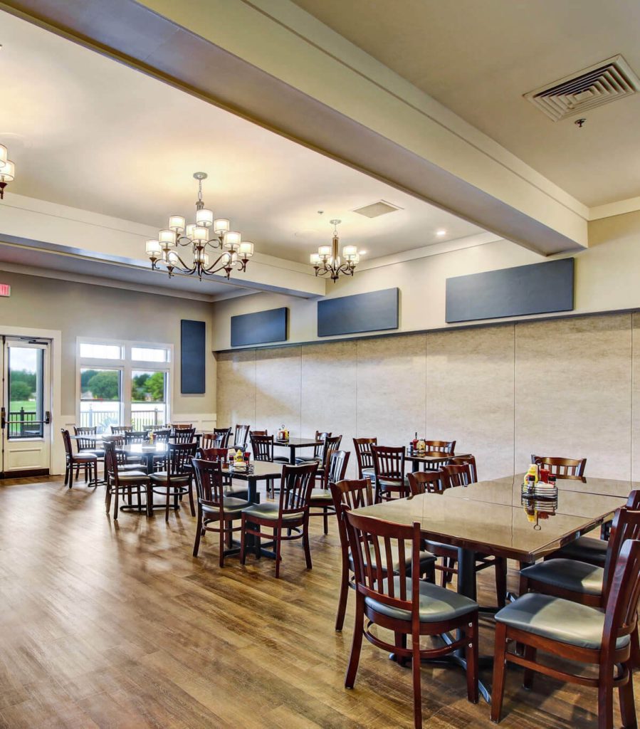 Restaurant dining tables inside a golf club
